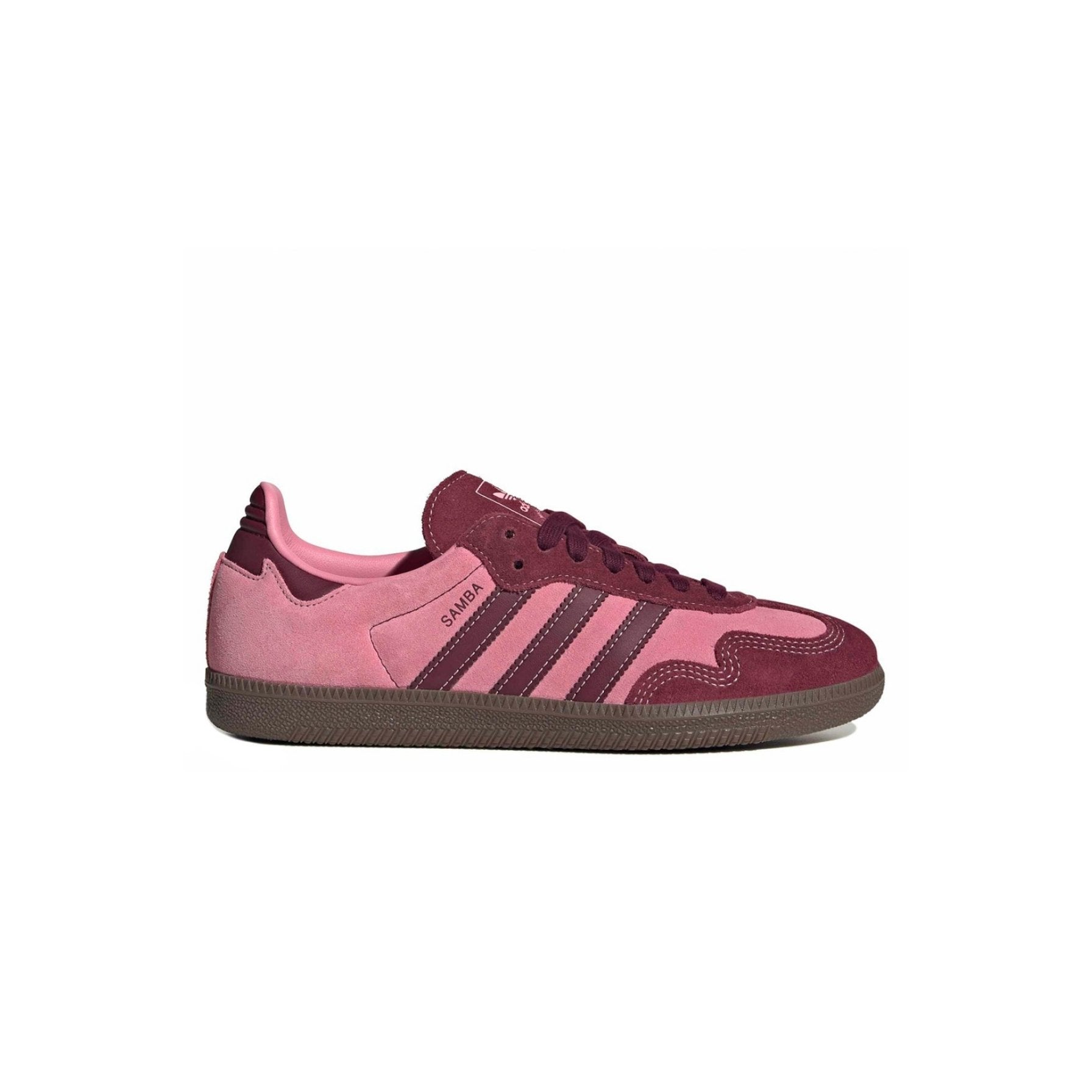 Pink and maroon sneaker with Adidas logo on a white background