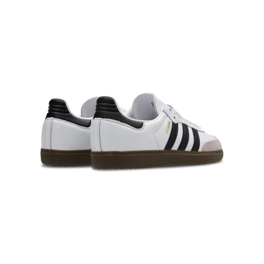 White sneakers with black stripes on a white background