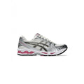 Silver and pink running shoe on a white background