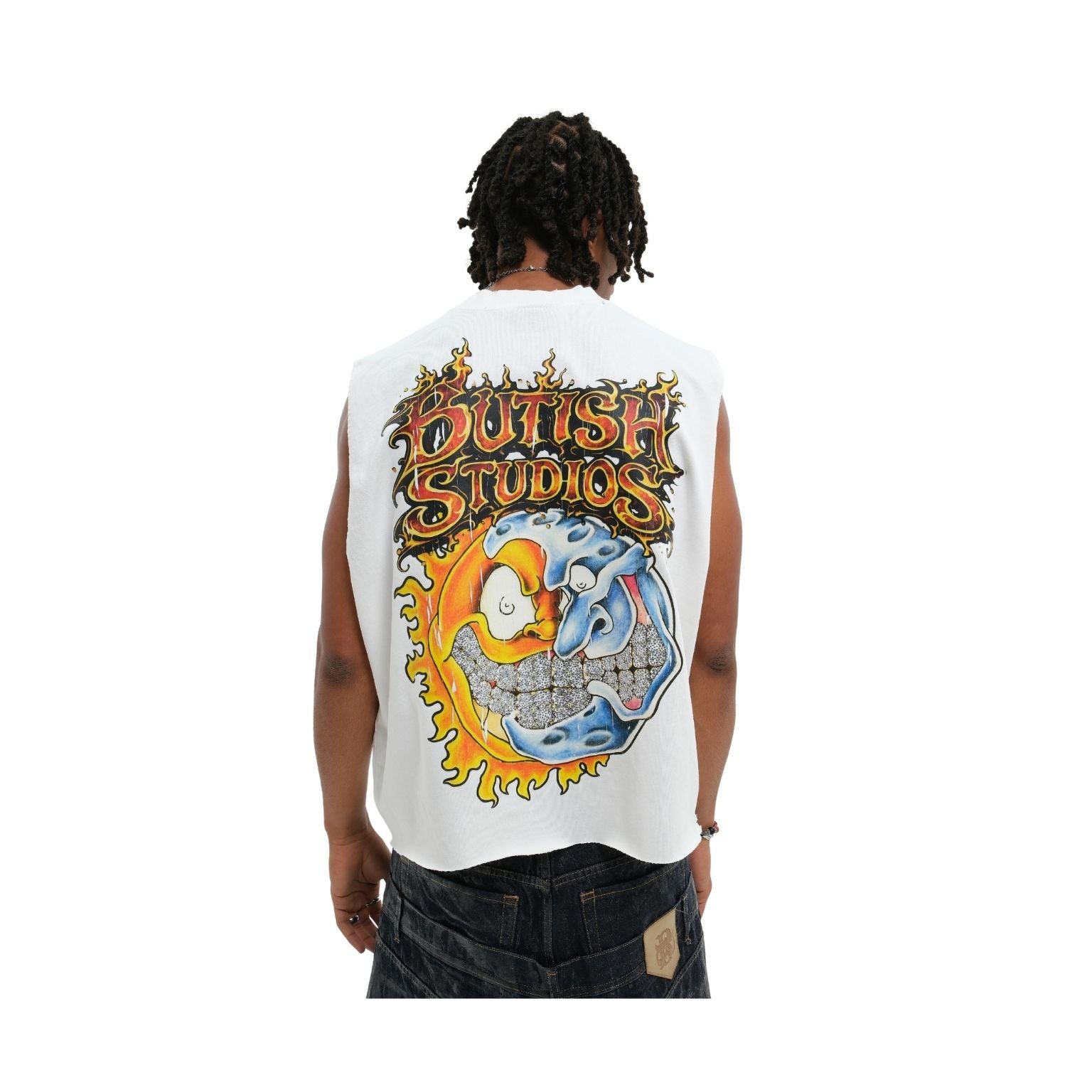 A man viewed from behind wearing a sleeveless white t-shirt with a large graphic on the back. The graphic features the text 'BUTCH STUDIOS' in a stylized orange font above a split yin-yang style illustration with a smiling sun and a blue-gray cloud.