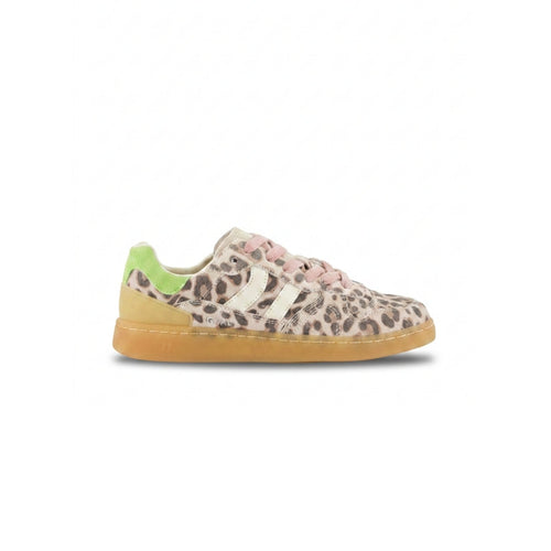Sneaker with leopard print pattern and green accent on a white background