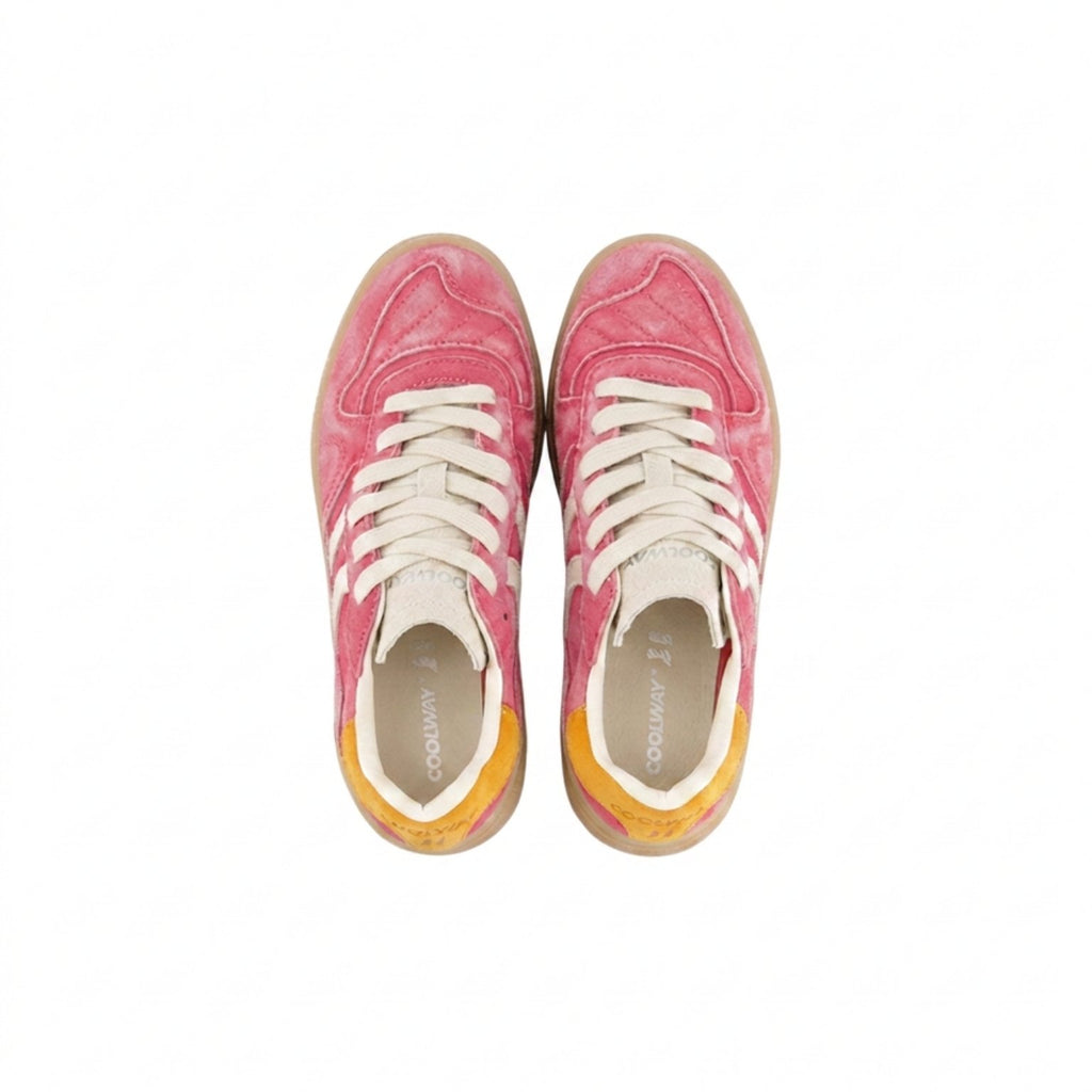 Pink sneakers with white laces on a white background