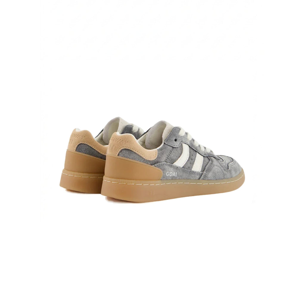 A pair of low-top sneakers in gray suede and leather, featuring beige overlays, white laces, and tan rubber soles, shown against a plain white background.