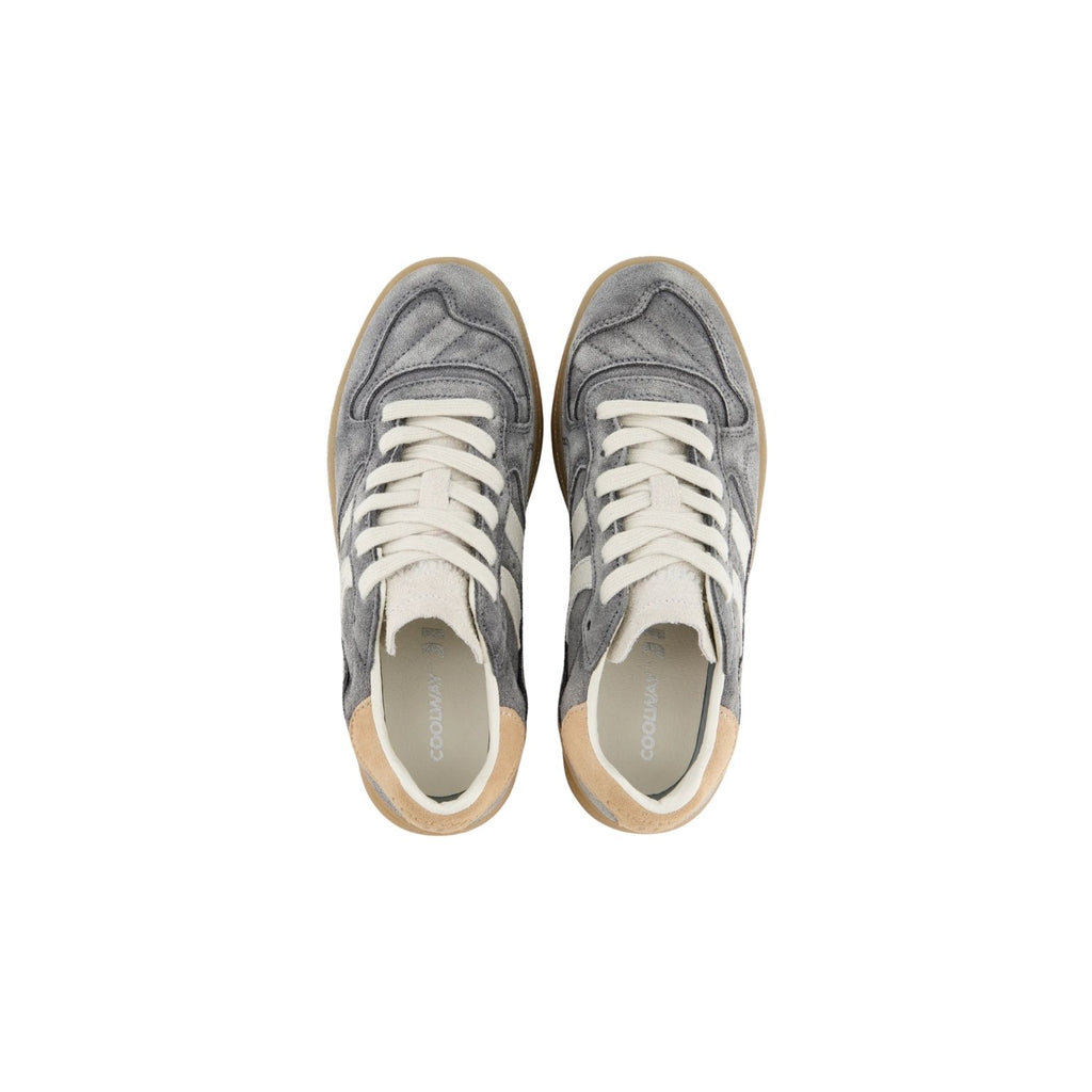 A pair of low-top sneakers shown from a top-down view, featuring a gray suede and leather upper with white laces and a light tan sole.