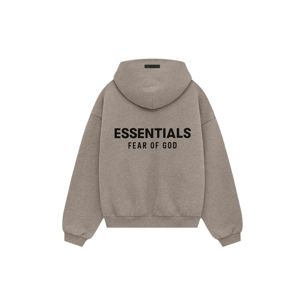 A light taupe heather gray hoodie shown from the back, featuring the text 'ESSENTIALS' and 'FEAR OF GOD' printed in black across the center.