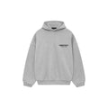 A light gray heather pullover hoodie with 'ESSENTIALS' and 'FEEL OF GOD' printed in black on the left chest, displayed on a clean white background.