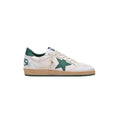 A single Golden Goose sneaker in off-white leather with a prominent green star on the side, a green heel tab, and a tan suede midsole, shown against a plain white background.