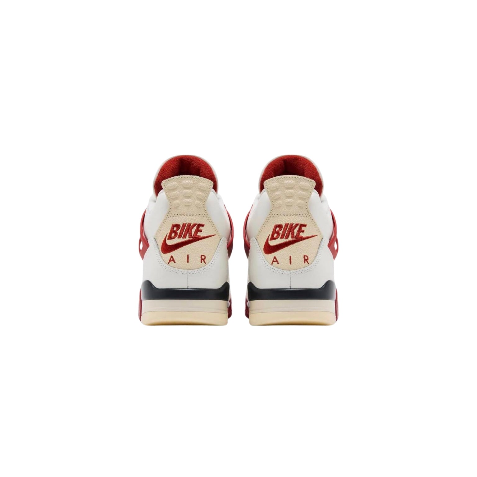 Pair of white sneakers with red and black accents on a white background