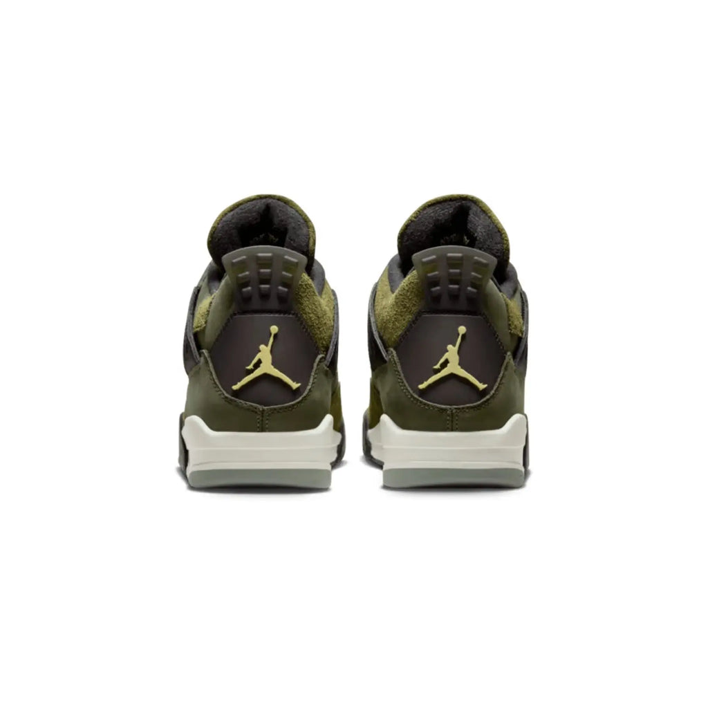 Pair of green sneakers with a logo on a white background