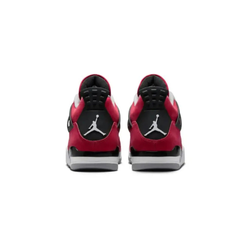 A pair of red and black Air Jordan 4 Retro Low sneakers shown from the back, featuring the iconic Jumpman logo on the heel, a red and black suede upper, and a white and gray midsole.
