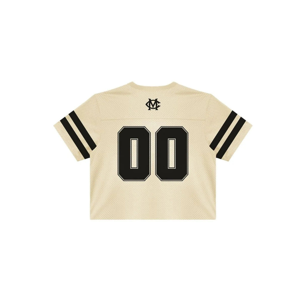 Beige sports jersey with black numbers and accents on a white background