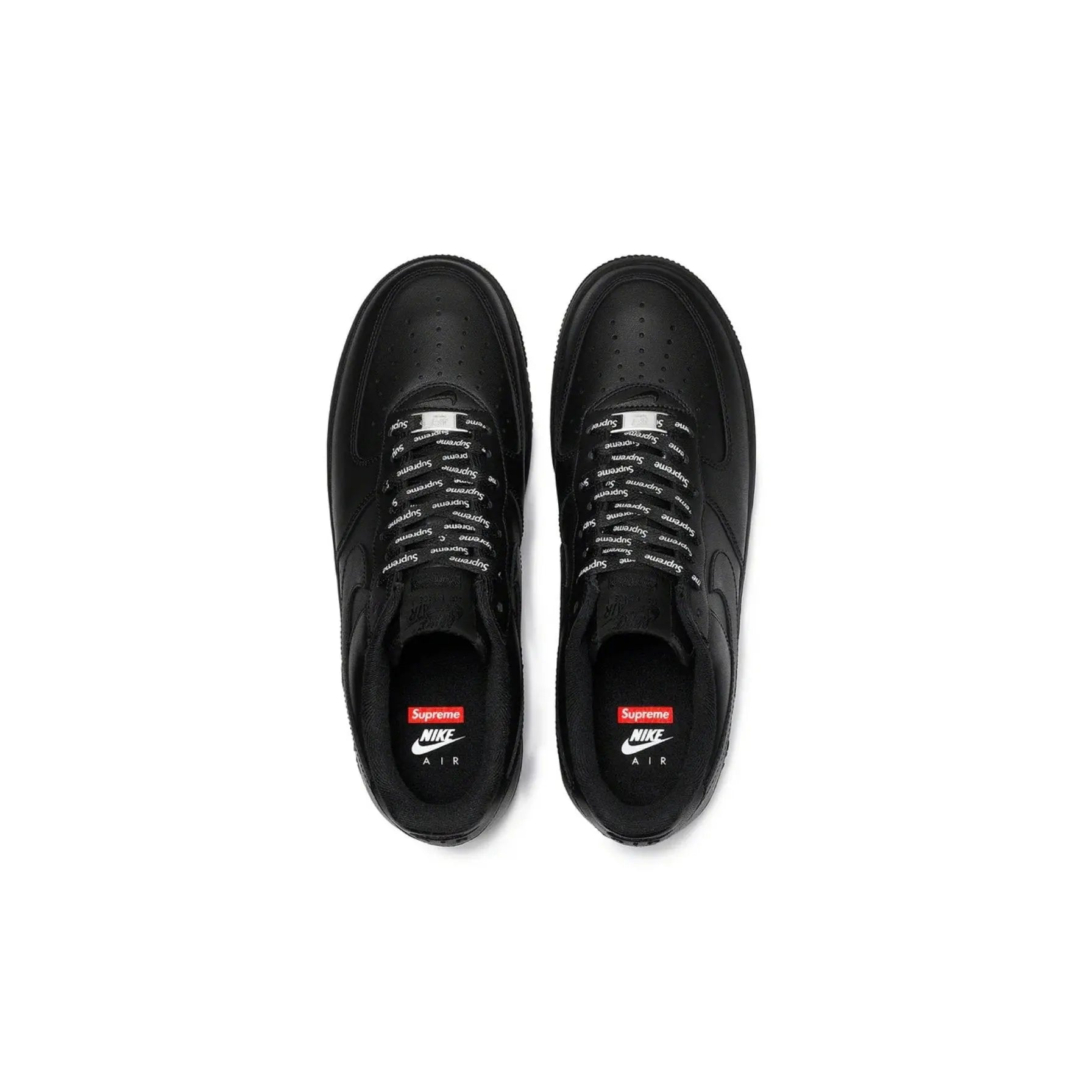 Black sneakers with Supreme and Nike logos on a white background