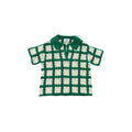 Green and white checkered shirt on a white background