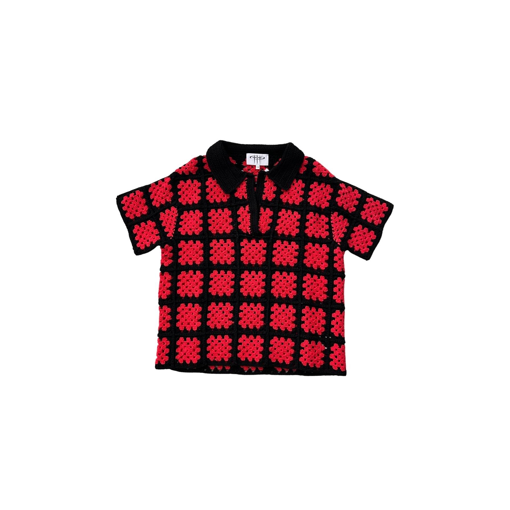 Black and red patterned shirt on a white background