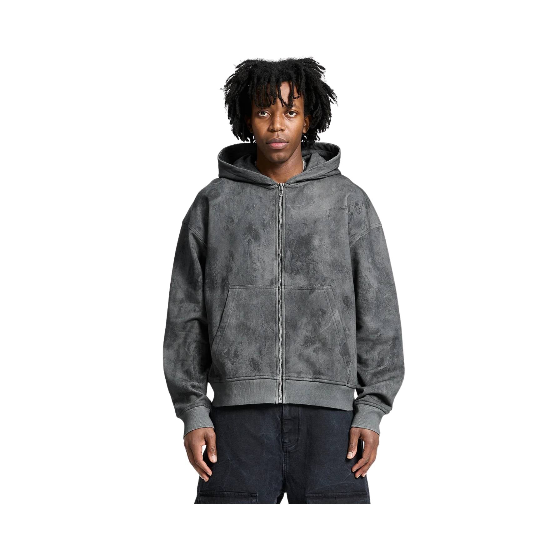Person wearing a gray hoodie on a white background