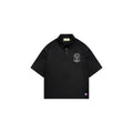 Black polo shirt with a logo on a white background
