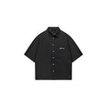Black short-sleeve shirt with brand logo on a white background