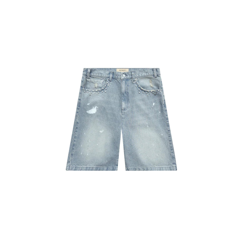 Light blue denim shorts with distressed details on a white background