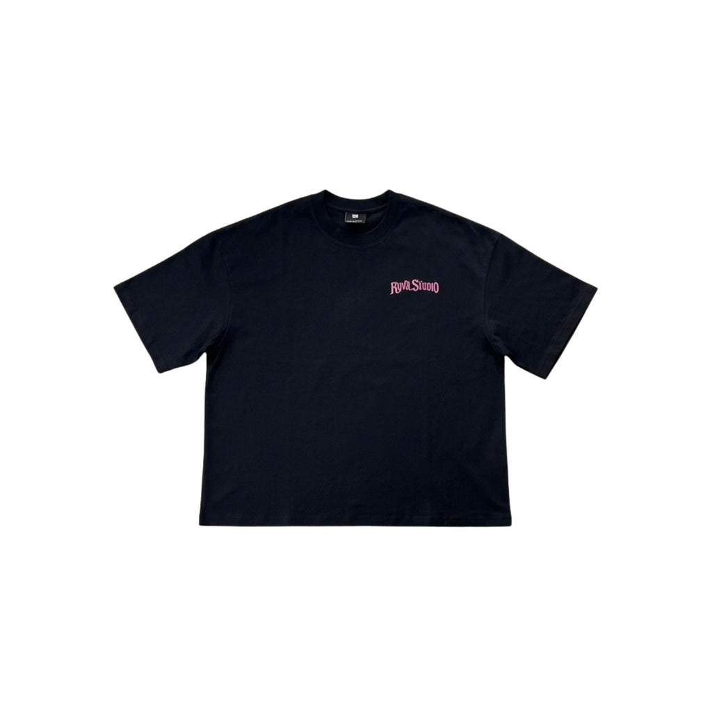 A black short-sleeve t-shirt with a small pink 'Rust & Stone' logo printed on the left chest, displayed flat against a solid white background.