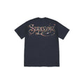 A black short-sleeve t-shirt with a large 'Supreme' logo across the chest, decorated with a colorful pattern of small stars and dots, shown on a plain white background.