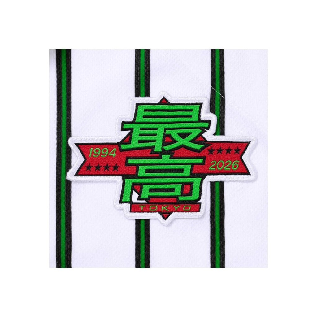 Sticker with green text and red banner on a white background