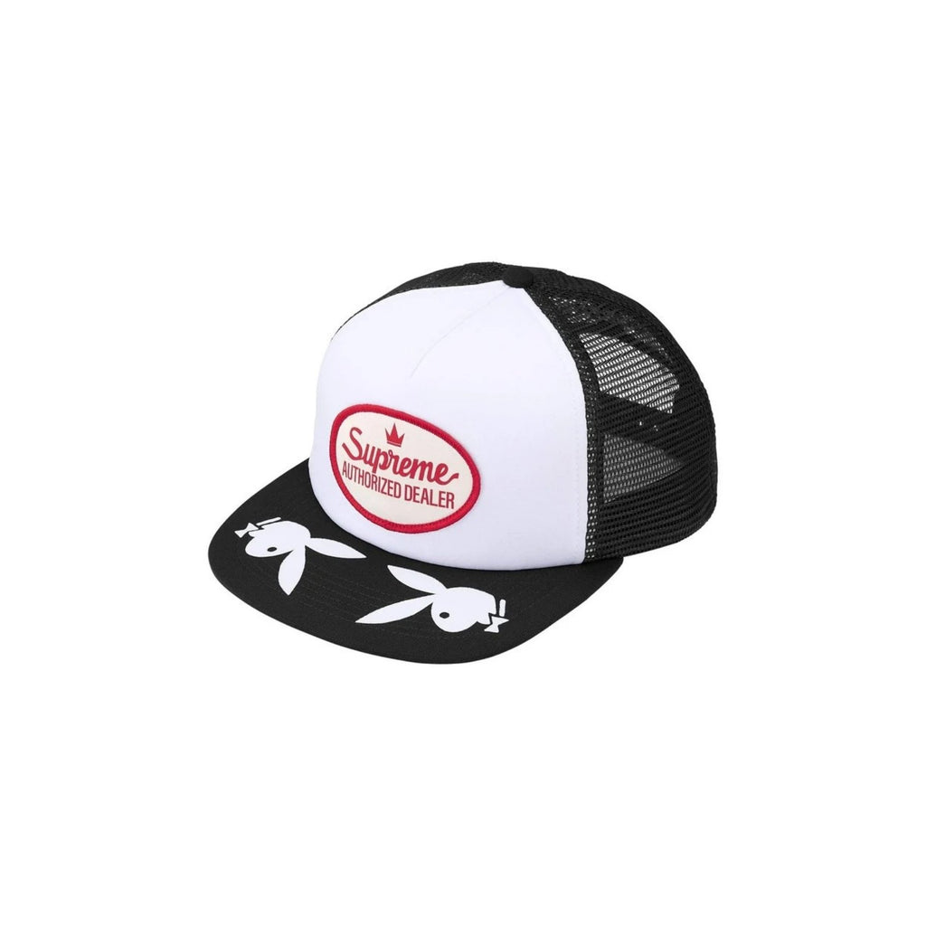 Black and white cap with Supreme logo on a white background